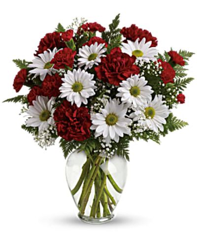 Share your heart's true feelings with this delightful red and white bouquet. A lovely choice on any special day, this charming mix of red and white blooms is a classic show of kindness they'll always remember.
Red carnations, red miniature carnations, white daisy spray chrysanthemums, baby's breath and leatherleaf fern.
<ul>
 	<li>Our florists hand-design each arrangement, so colors, varieties and containers may vary due to local availability</li>
</ul>