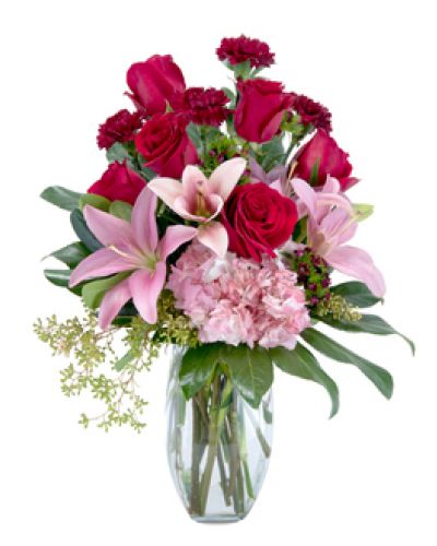 When only the best will do, send this regal display of rich red roses, blush pink Asiatic lilies and hydrangea, deep burgundy carnations and sweet William. The bouquet is designed in a clear glass vase and beautifully collared with rich green foliage.
<ul>
 	<li>Our florists hand-design each arrangement, so colors, varieties and containers may vary due to local availability</li>
</ul>